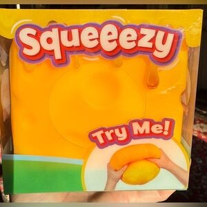 NEW Squeeezy Cheese Yellow stress cube and fidget
